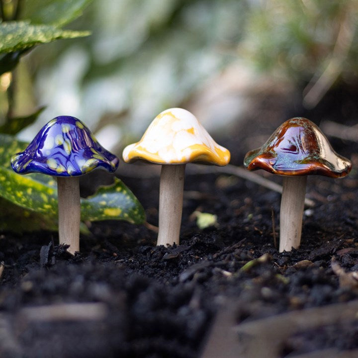 Set of 18 Ceramic Mushroom Plant Pot Decorations in Display