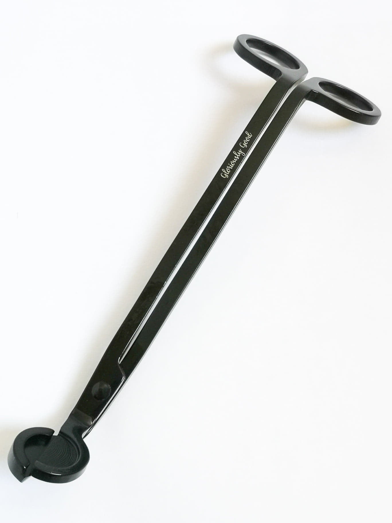 Luxury matt black wick trimmer made of coated stainless steel with Gloriously Good logo, standard size