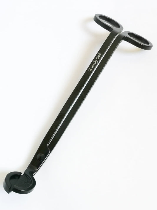 Luxury matt black wick trimmer made of coated stainless steel with Gloriously Good logo, standard size