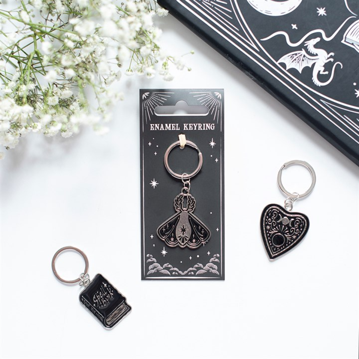 Black moth keyring