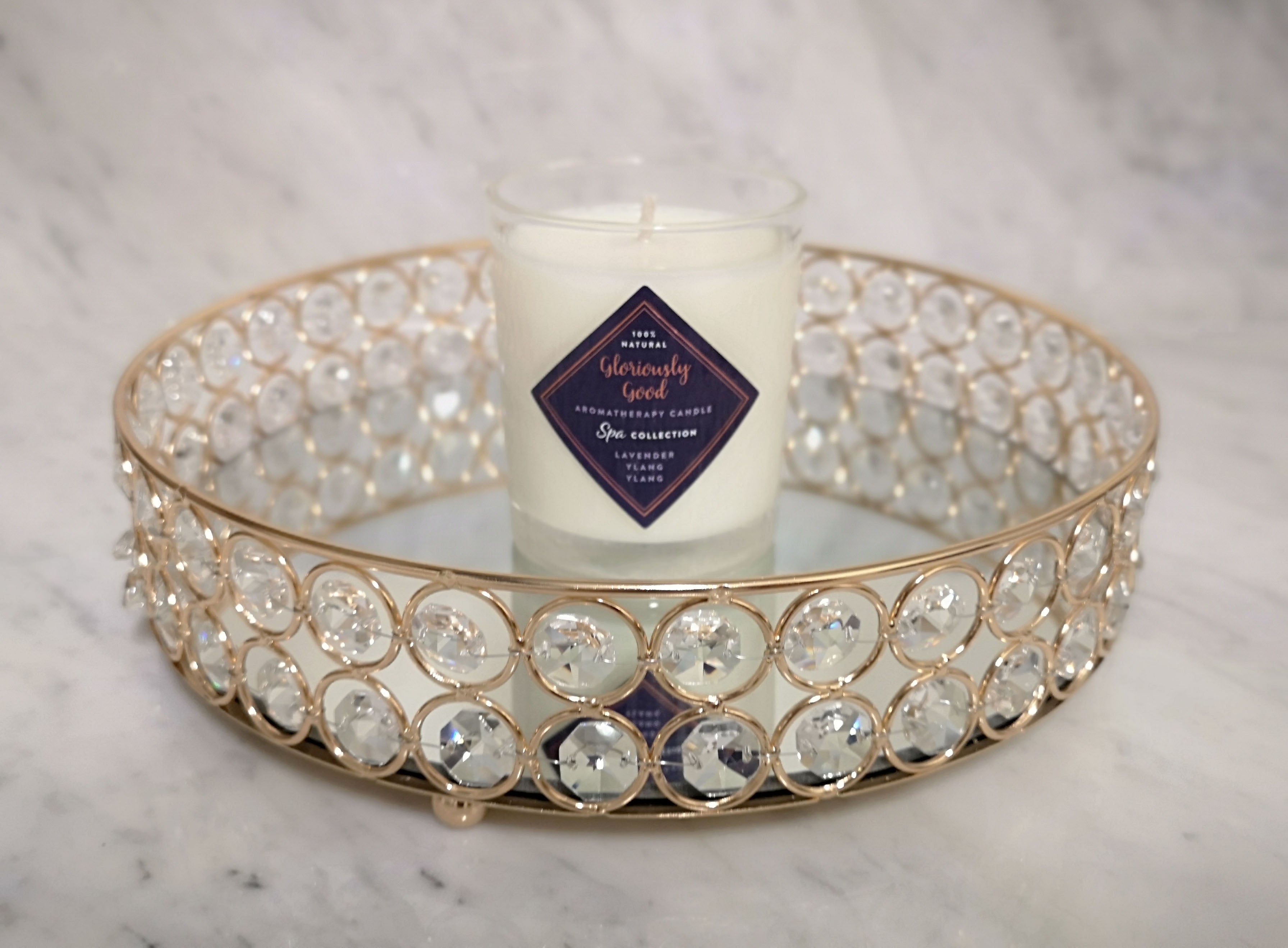 Lavender and Ylang Ylang aromatherapy candle on mirror decorative tray with crystals